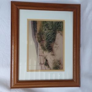 Framed photo by Susan Levick titled "Sand  Beach"